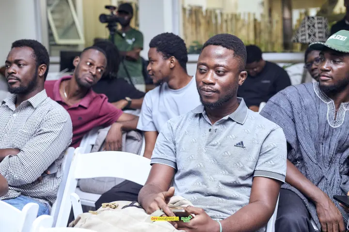 Attendees listening together during a DevCongress meetup